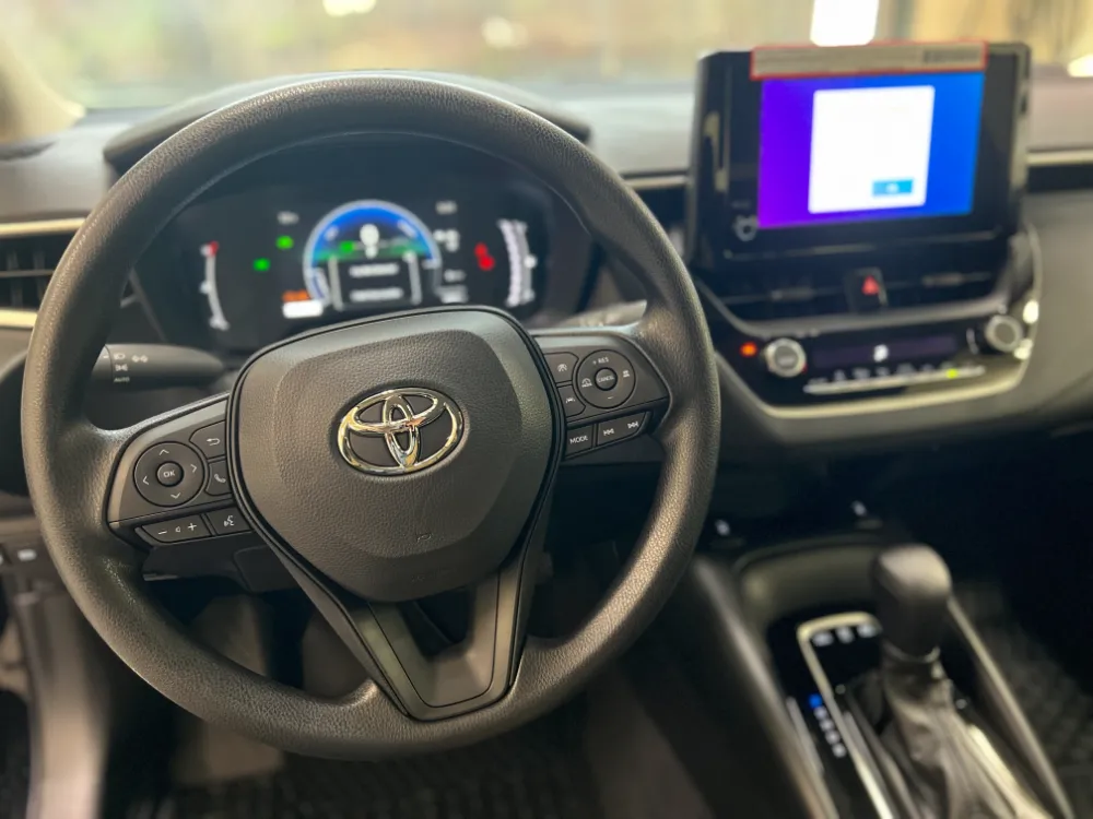 2023 toyota corolla hybrid le in black 14